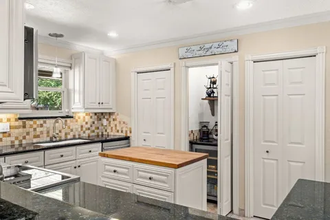 a view of hallway and closet