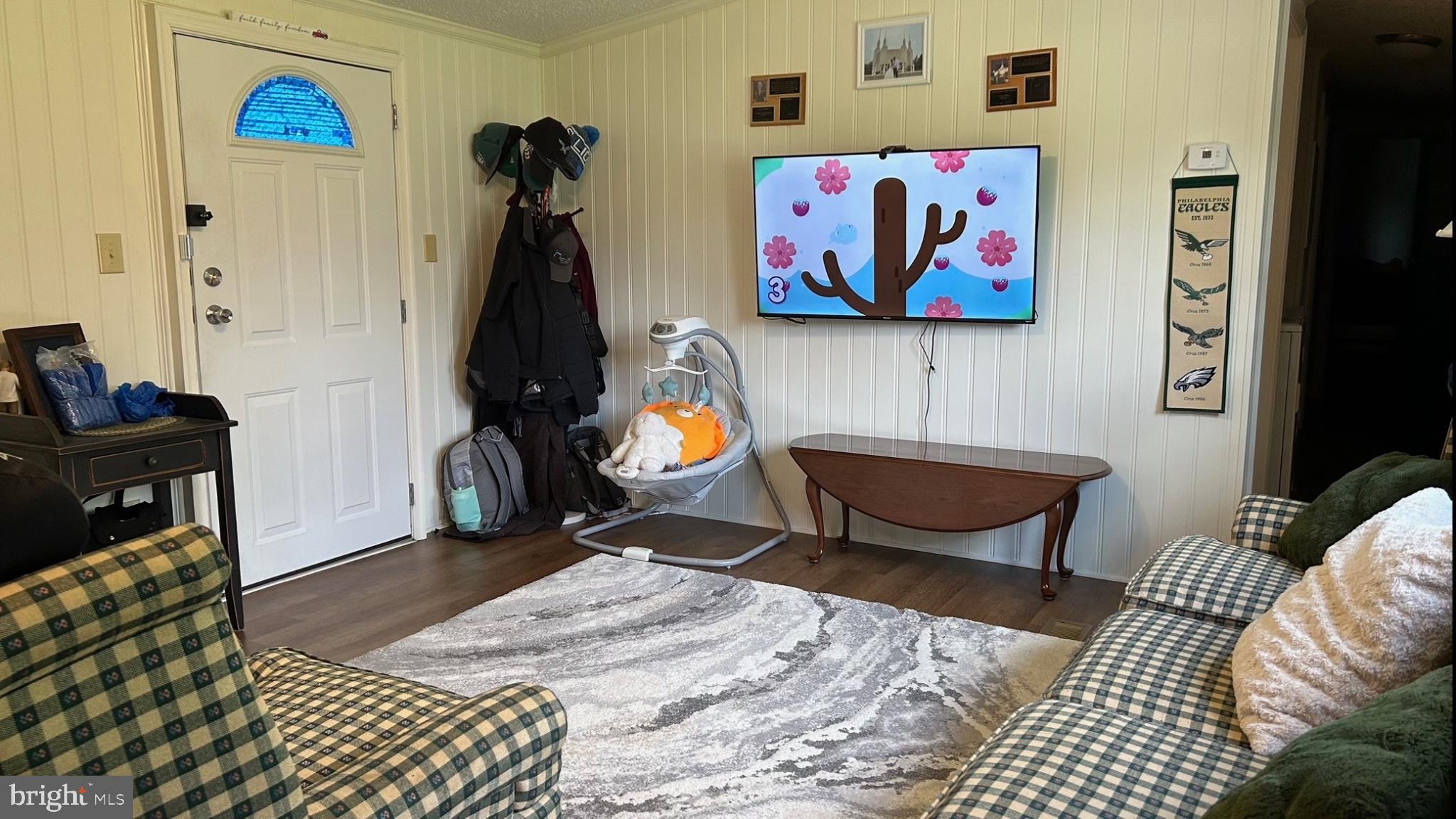 13123 Mentzer Gap Road, Unit 1 Waynesboro, PA 17268 - Photo 11 of 23 Cozy living space with vibrant decor.