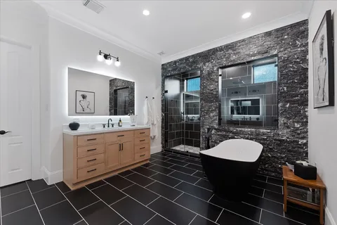 a bathroom with a shower and a sink