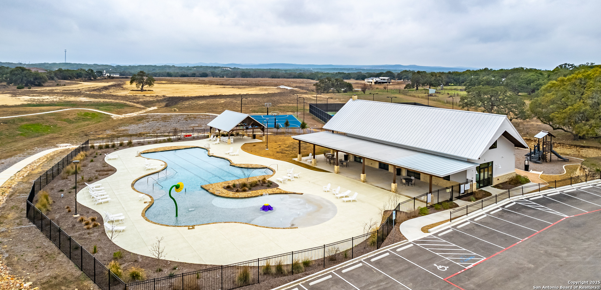 34720 Ansley Rdg Trail Bulverde, TX 78163 - Photo 23 of 24 an aerial view of a house with swimming pool and city view