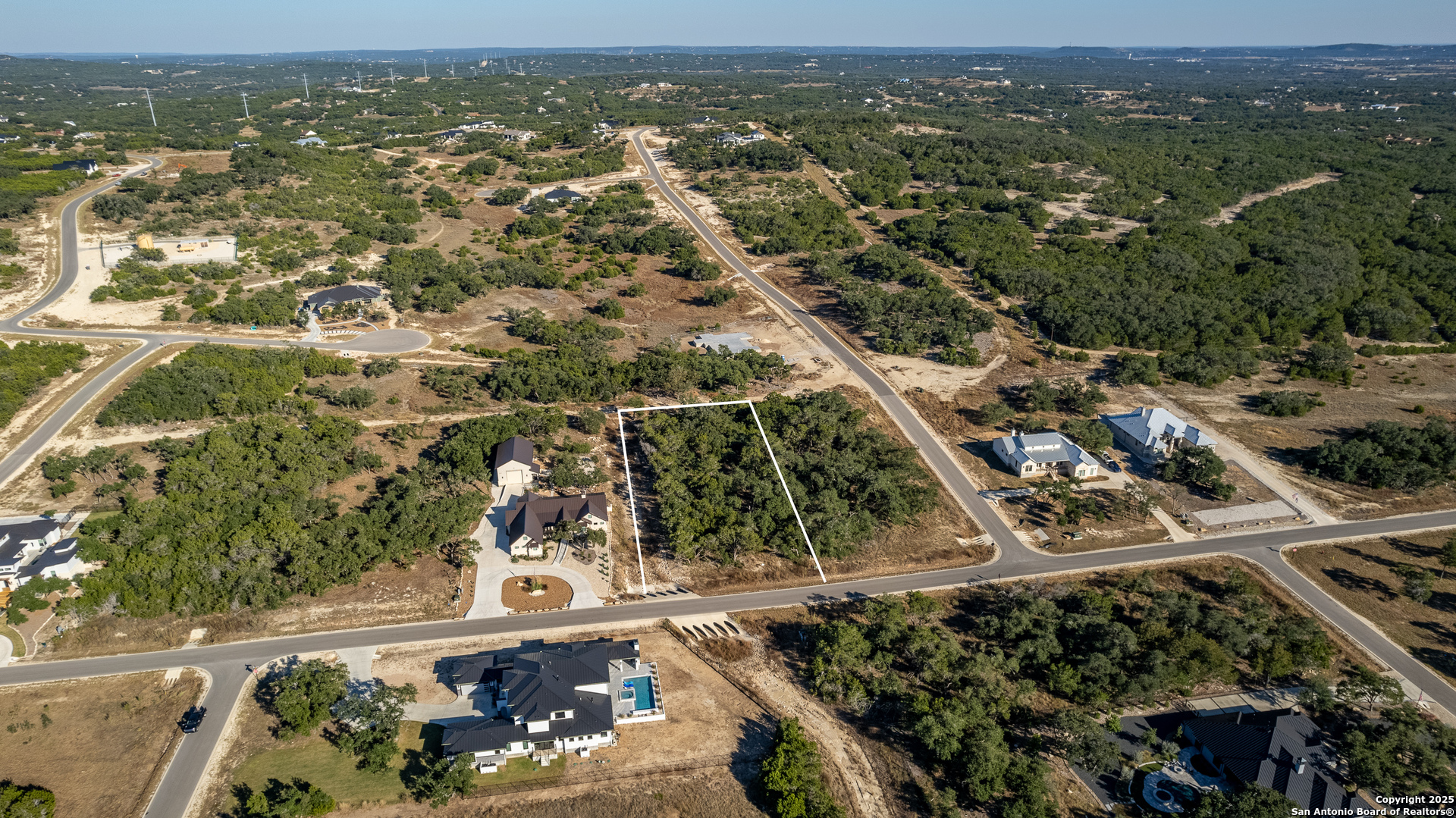 34720 Ansley Rdg Trail Bulverde, TX 78163 - Photo 3 of 24 an aerial view of residential houses with outdoor space