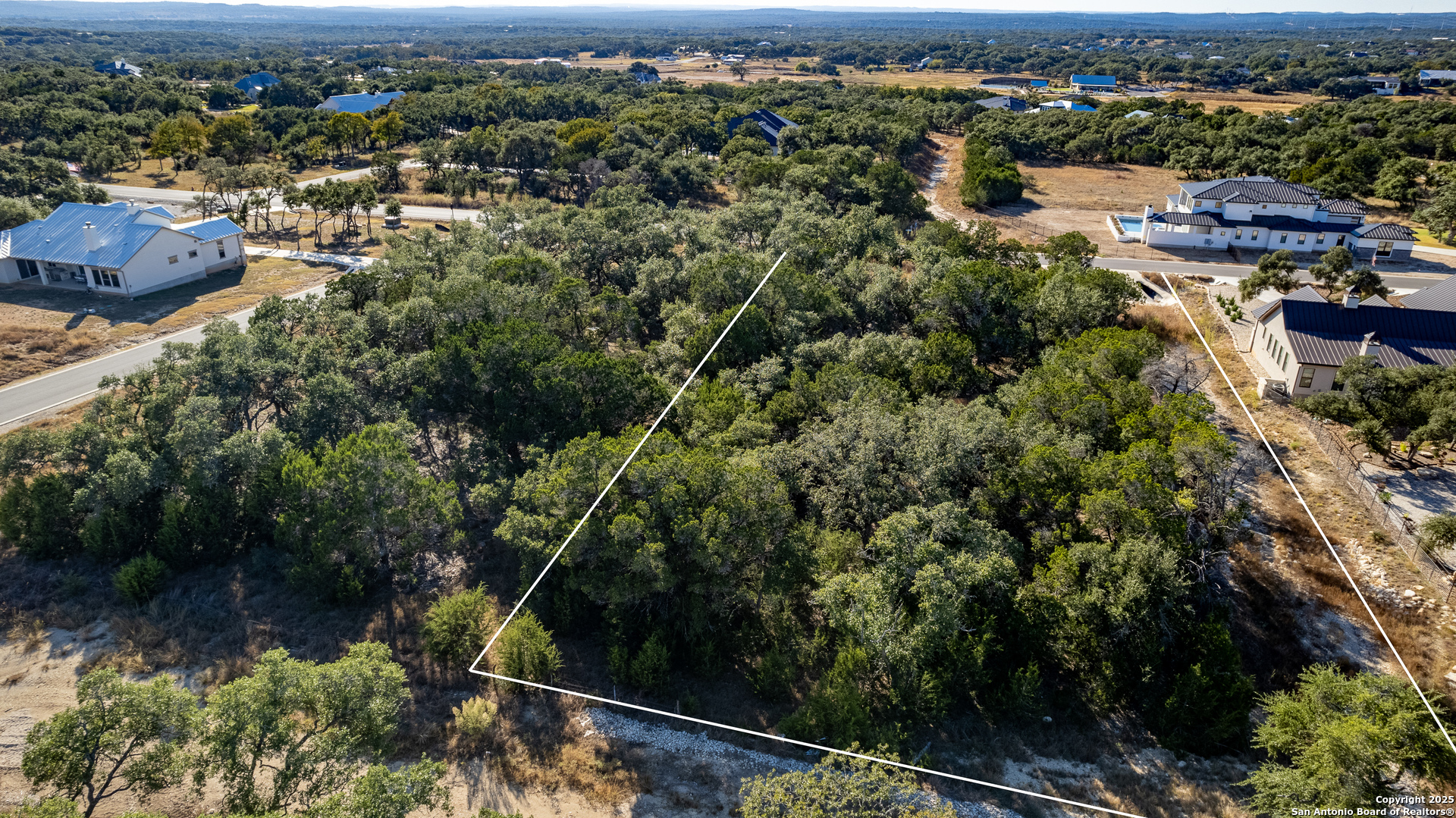 34720 Ansley Rdg Trail Bulverde, TX 78163 - Photo 5 of 24 an aerial view of multiple house