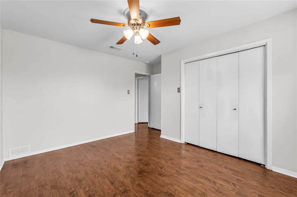 1409 Chapel Downs Waco, TX 76712 - Photo 10 of 20 a view of an empty room with a window