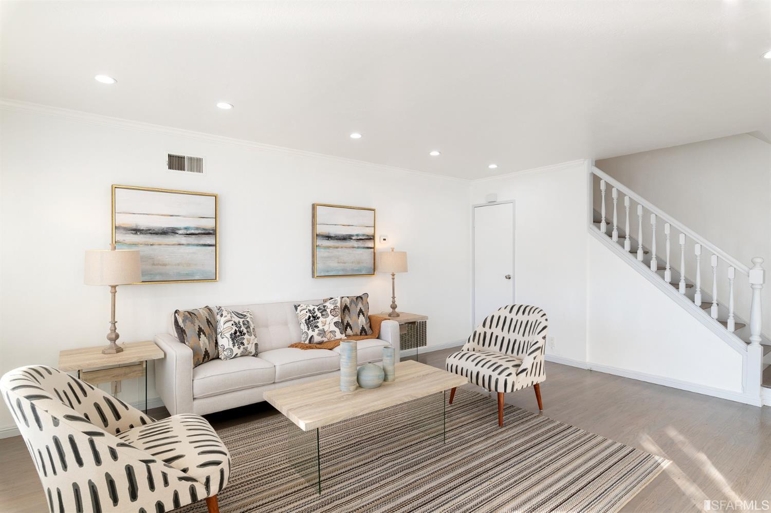 171 Beachview Avenue Pacifica, CA 94044 - Photo 11 of 52 a living room with furniture and stairs