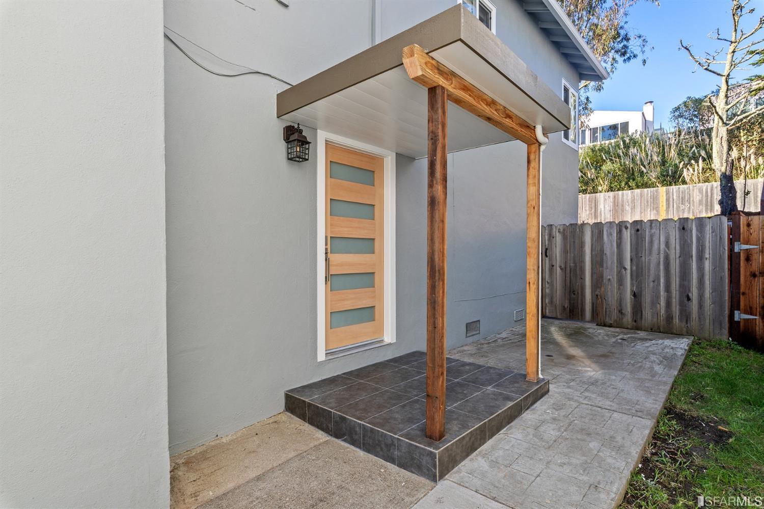171 Beachview Avenue Pacifica, CA 94044 - Photo 4 of 52 a view of a house with a small yard