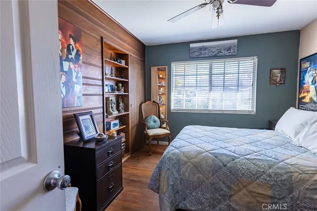 a bathroom with a granite countertop sink a toilet and bathtub