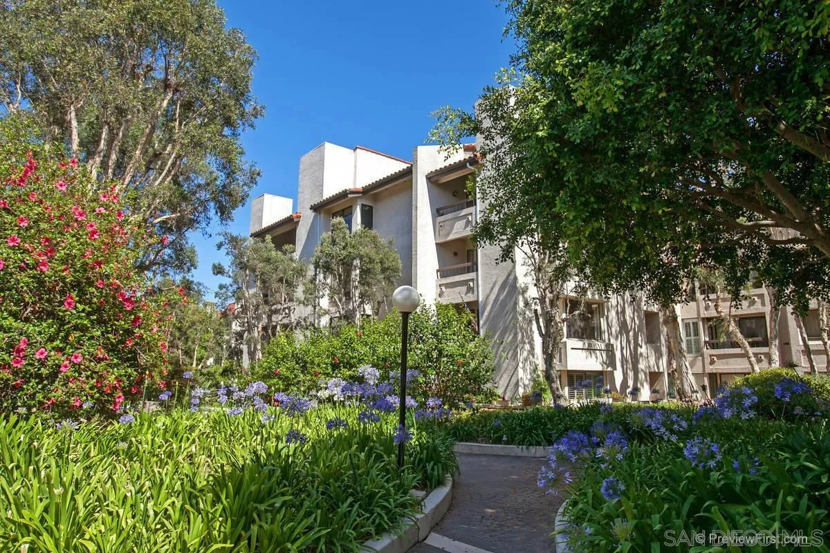5605 Friars Road, Unit 308 San Diego, CA 92110 - Photo 37 of 39 a view of a house with a tree