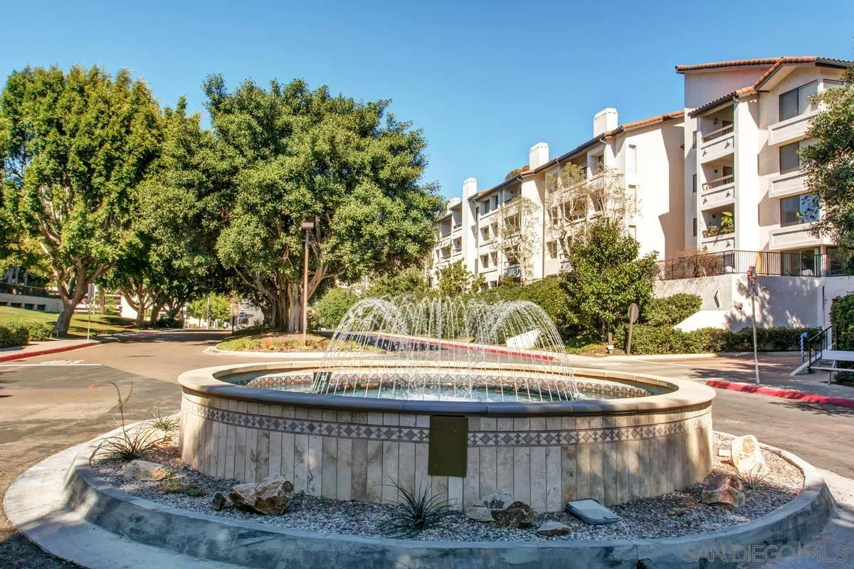 5605 Friars Road, Unit 308 San Diego, CA 92110 - Photo 38 of 39 a view of a fountain with tree in the background