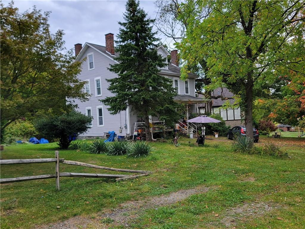 165 Herbst Road Coraopolis, PA 15108 - Photo 2 of 5 a view of a house with a yard