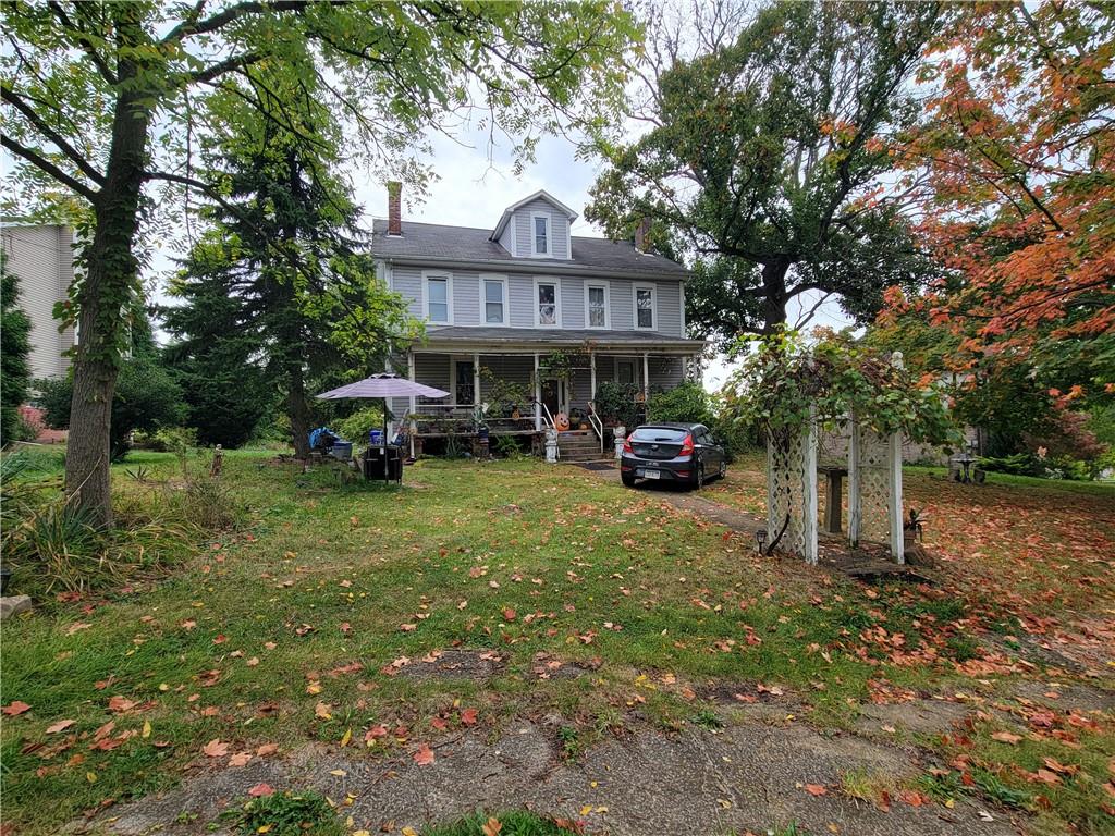 165 Herbst Road Coraopolis, PA 15108 - Photo 4 of 5 a house view with a garden space