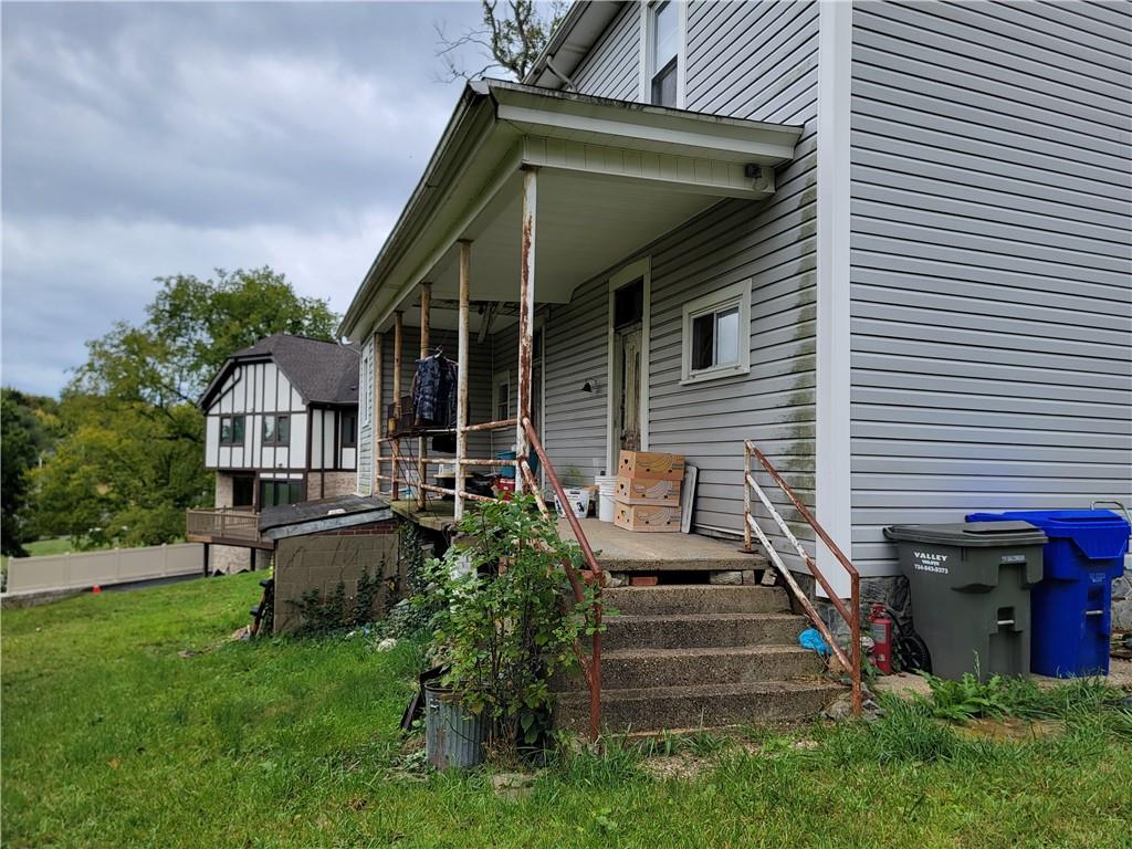 165 Herbst Road Coraopolis, PA 15108 - Photo 5 of 5 a front view of a house with garden
