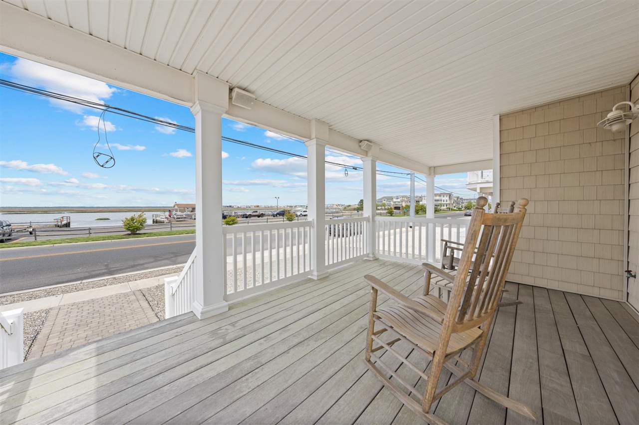 5441 Ocean Drive Avalon, NJ 08202 - Photo 3 of 26 a view of a balcony with wooden floor