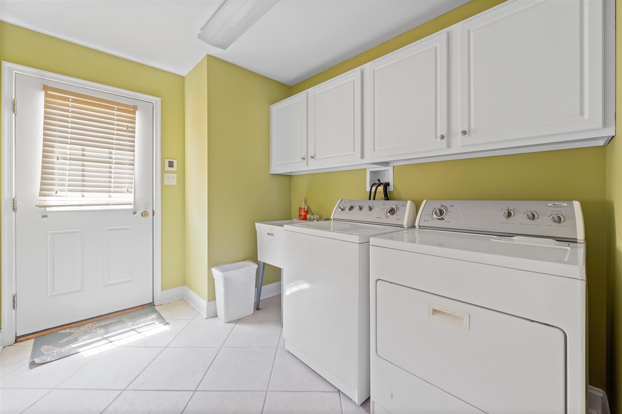 5441 Ocean Drive Avalon, NJ 08202 - Photo 8 of 26 a utility room with dryer and washer