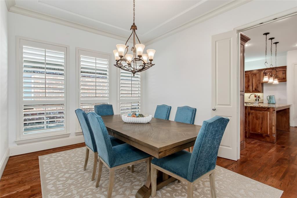 846 Deerfield Road Allen, TX 75013 - Photo 6 of 40 Dining area with hardwood flooring, crown molding, and plantation shutters