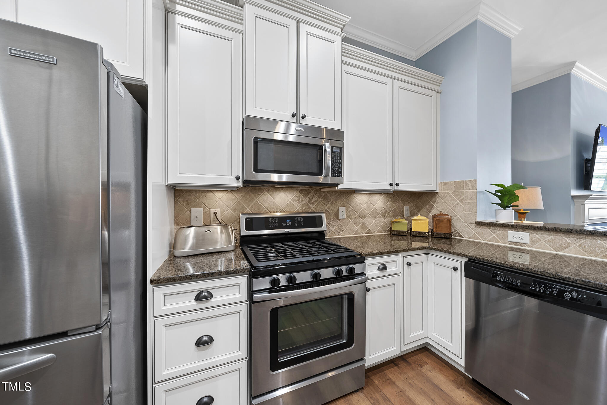 1365 Formal Garden Way Raleigh, NC 27603 - Photo 6 of 39 Kitchen features stainless steel appliances and a gas range