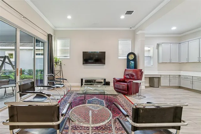 a living room with fireplace furniture and a flat screen tv