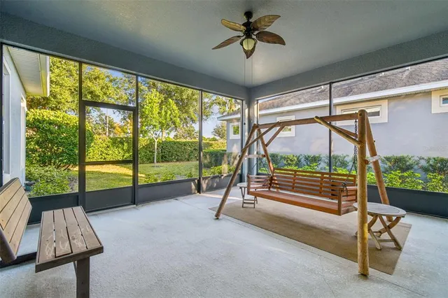 a bedroom with furniture and windows
