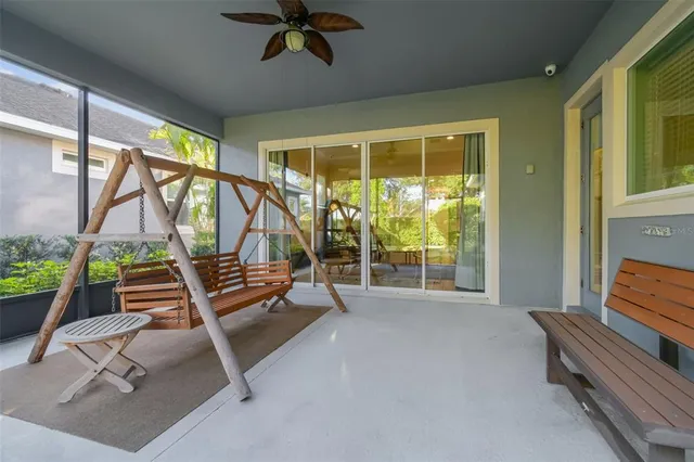 a view of a house with backyard and garden