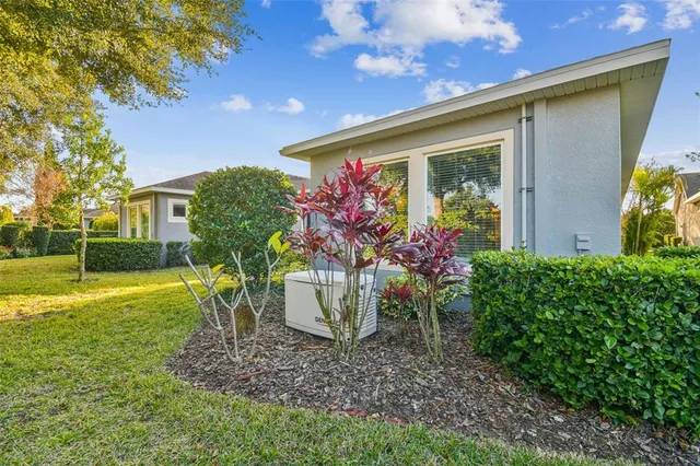 an aerial view of a house with a garden