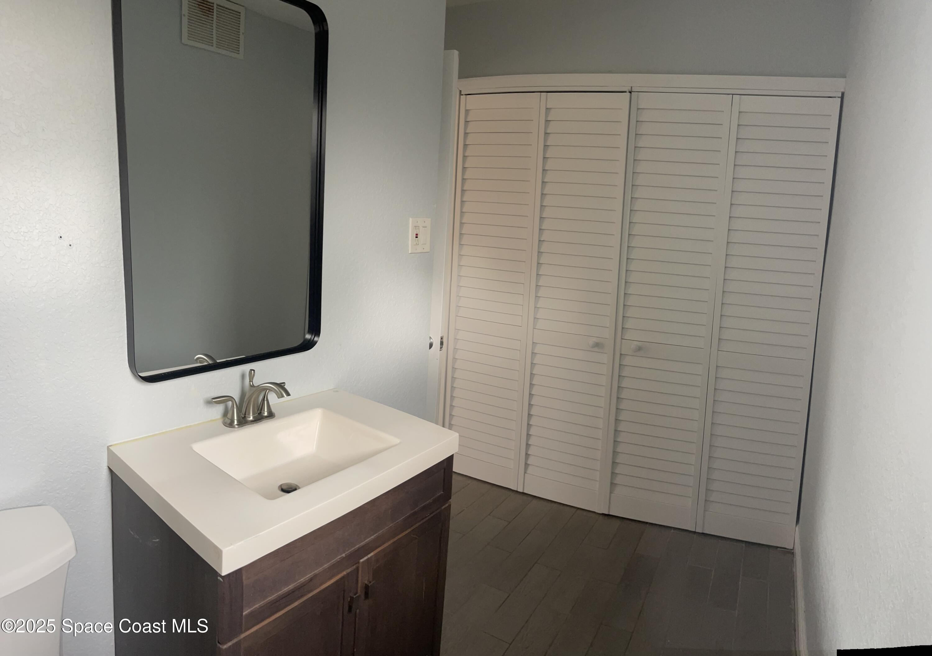6100 Ridgewood Avenue, Unit 7 Cocoa Beach, FL 32931 - Photo 5 of 15 IMG_9042