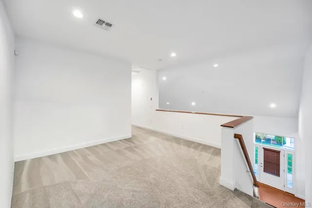 a view of a room with stairs