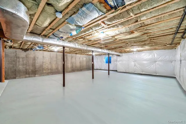 a view of a room with wooden walls