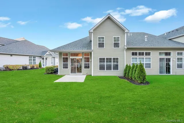 front view of a house and a yard