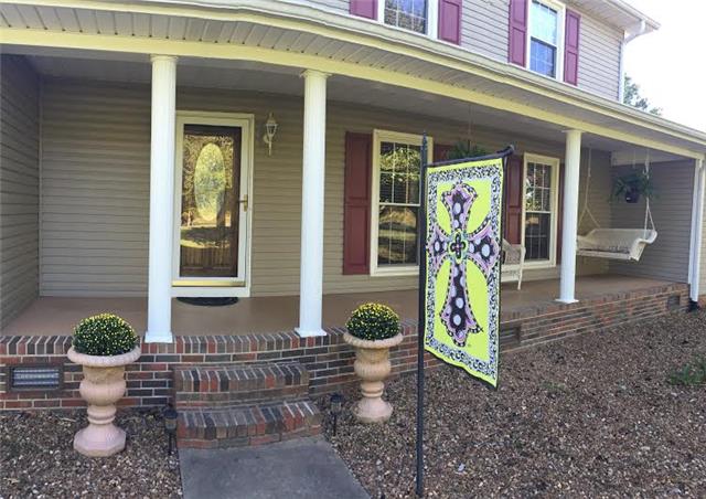 398 Patrick Road Fayetteville, TN 37334 - Photo 3 of 13 Large front porch featured with a swing, and plenty of space for more furniture!