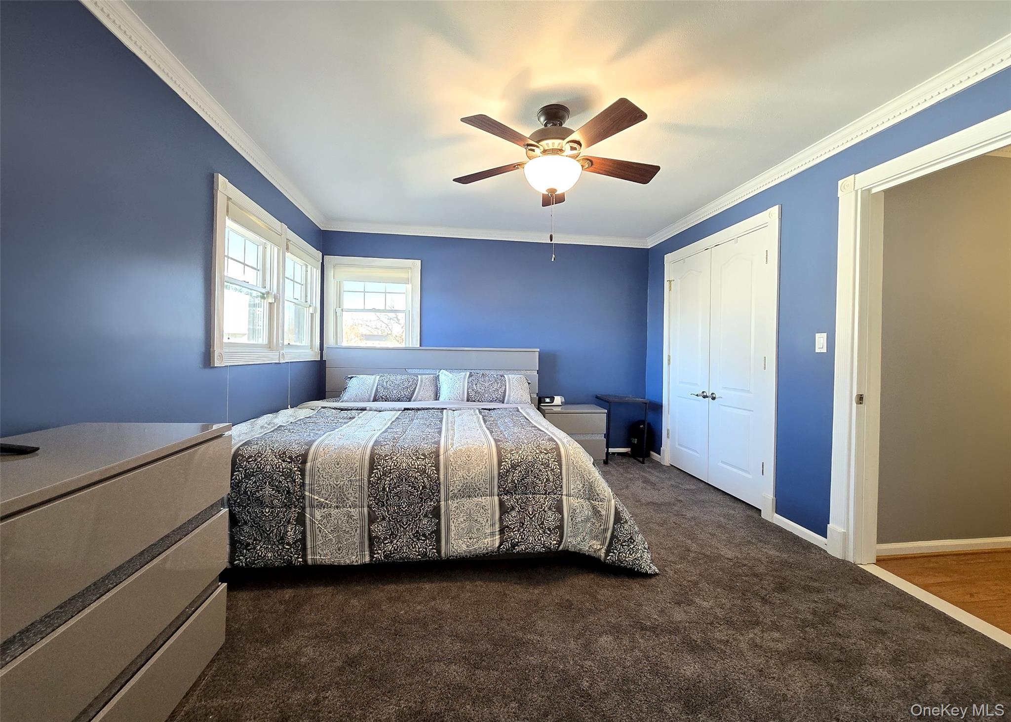 6 Virginia Road Centereach, NY 11720 - Photo 11 of 23 a spacious bedroom with a bed and window