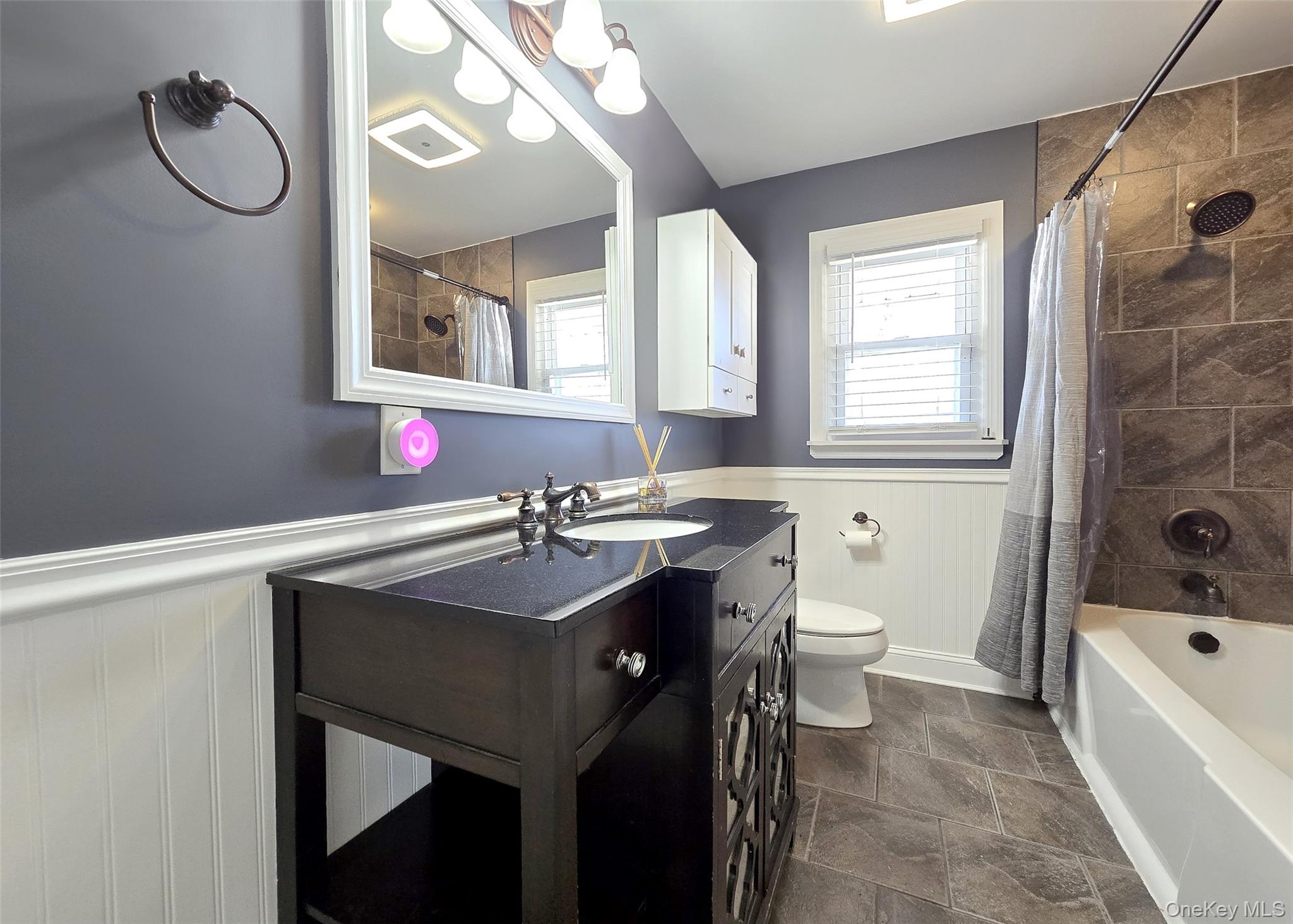 6 Virginia Road Centereach, NY 11720 - Photo 17 of 23 a bathroom with a sink and a mirror