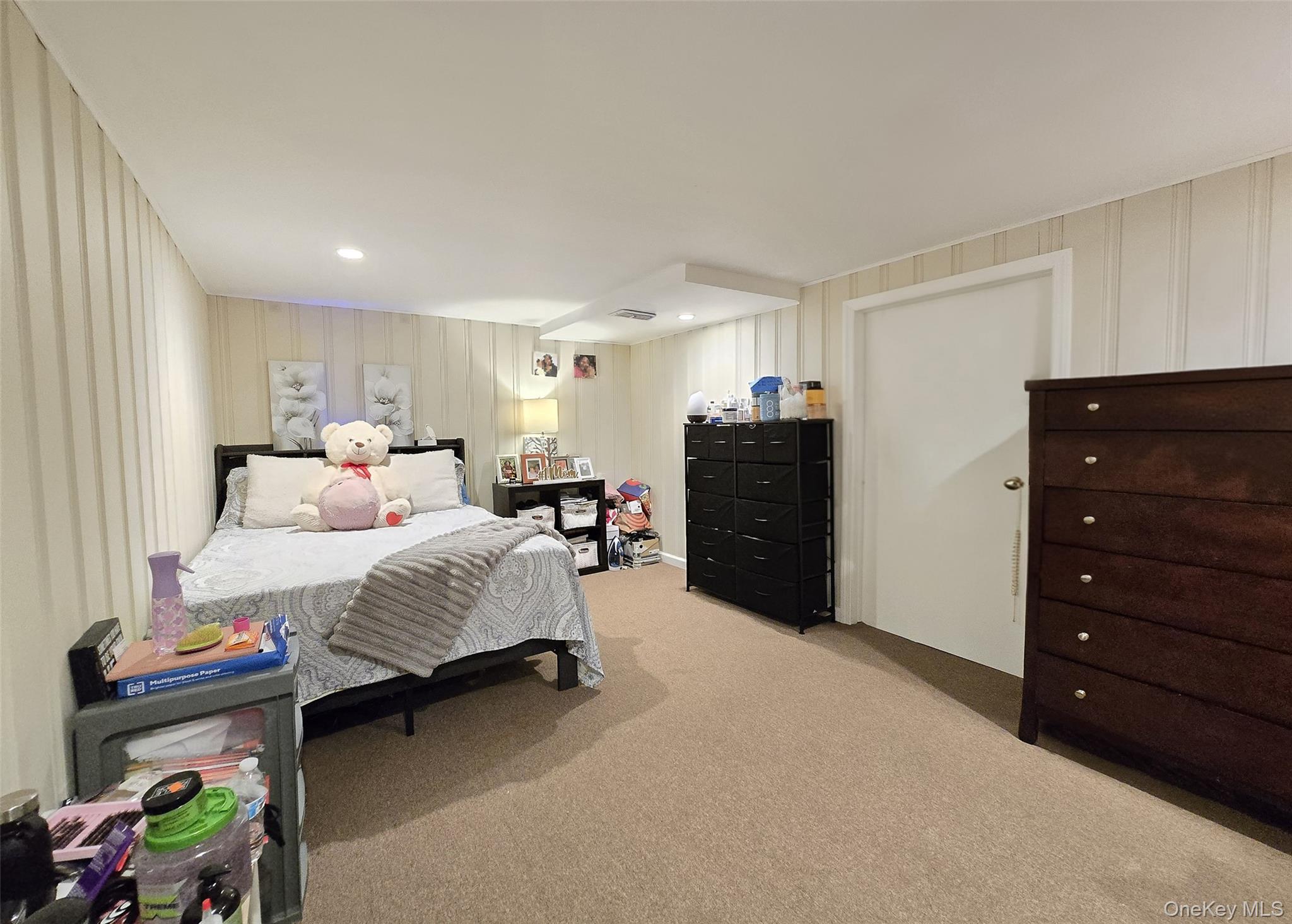 6 Virginia Road Centereach, NY 11720 - Photo 20 of 23 a bedroom with a bed and a closet