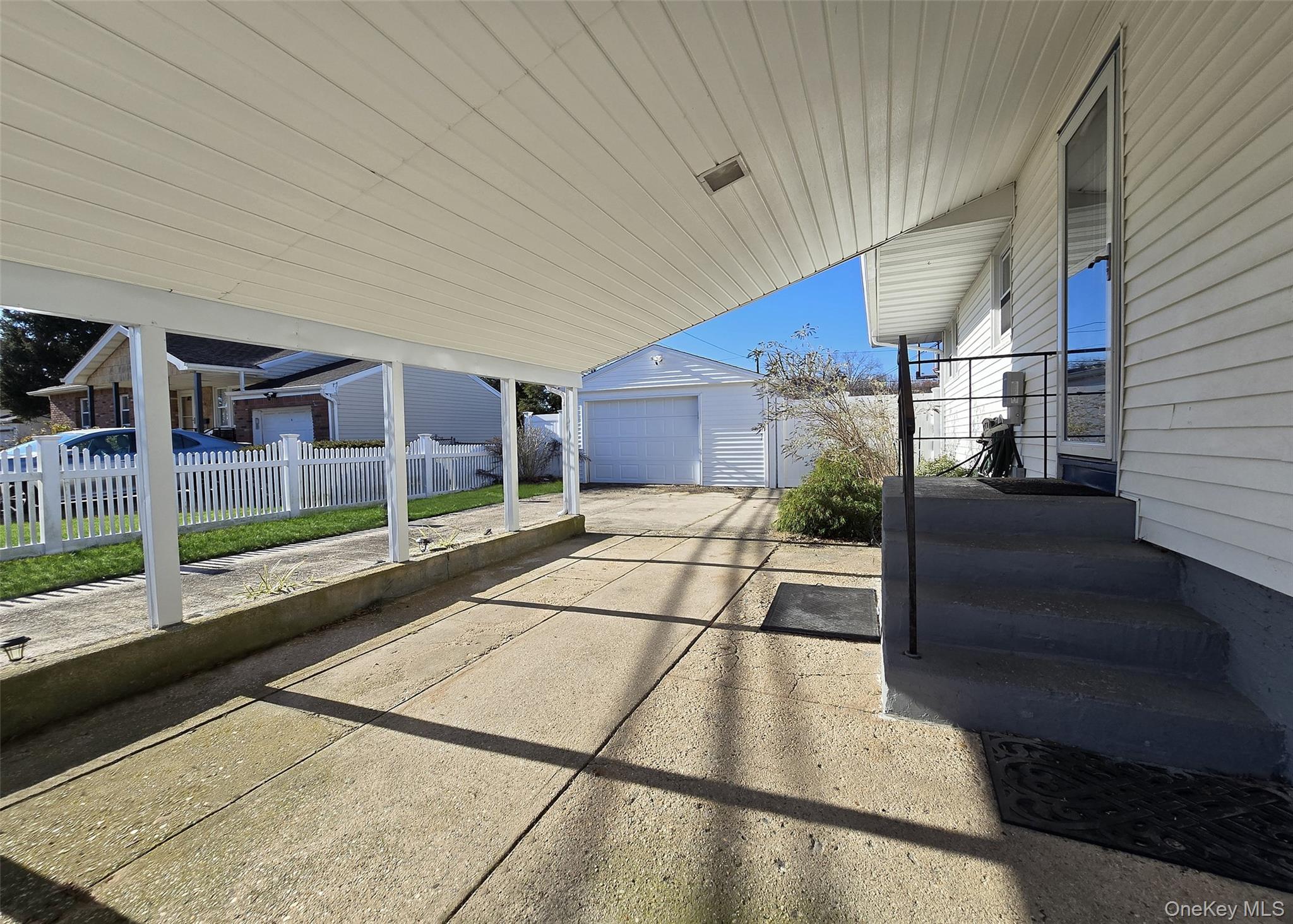 6 Virginia Road Centereach, NY 11720 - Photo 2 of 23 a view of a backyard