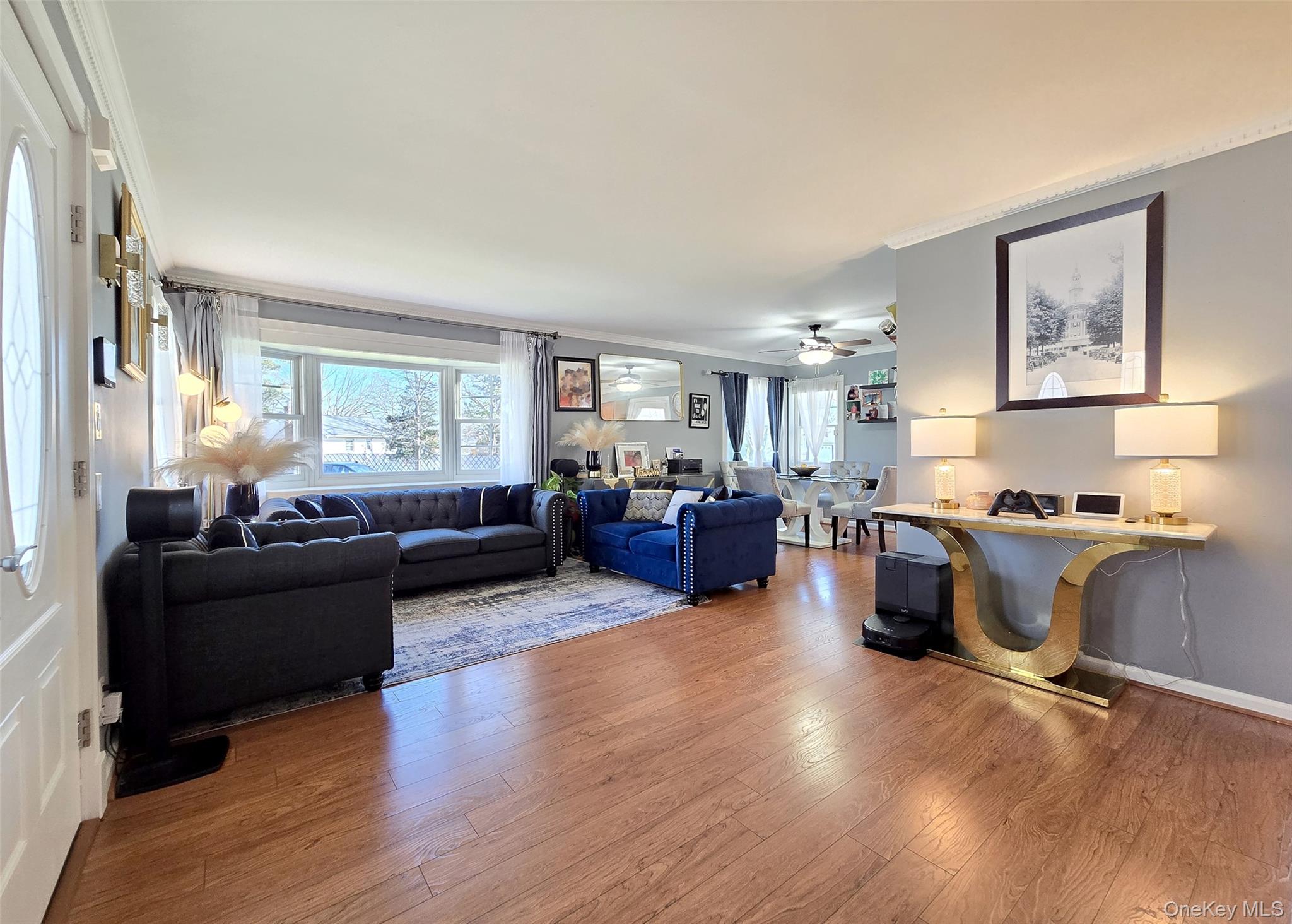 6 Virginia Road Centereach, NY 11720 - Photo 5 of 23 a living room with furniture or couch and a window