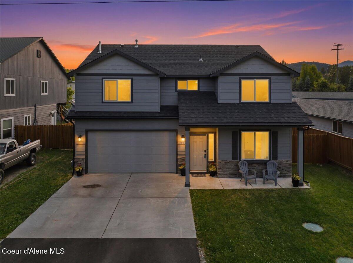 01-Twilight Aerial Front of Home