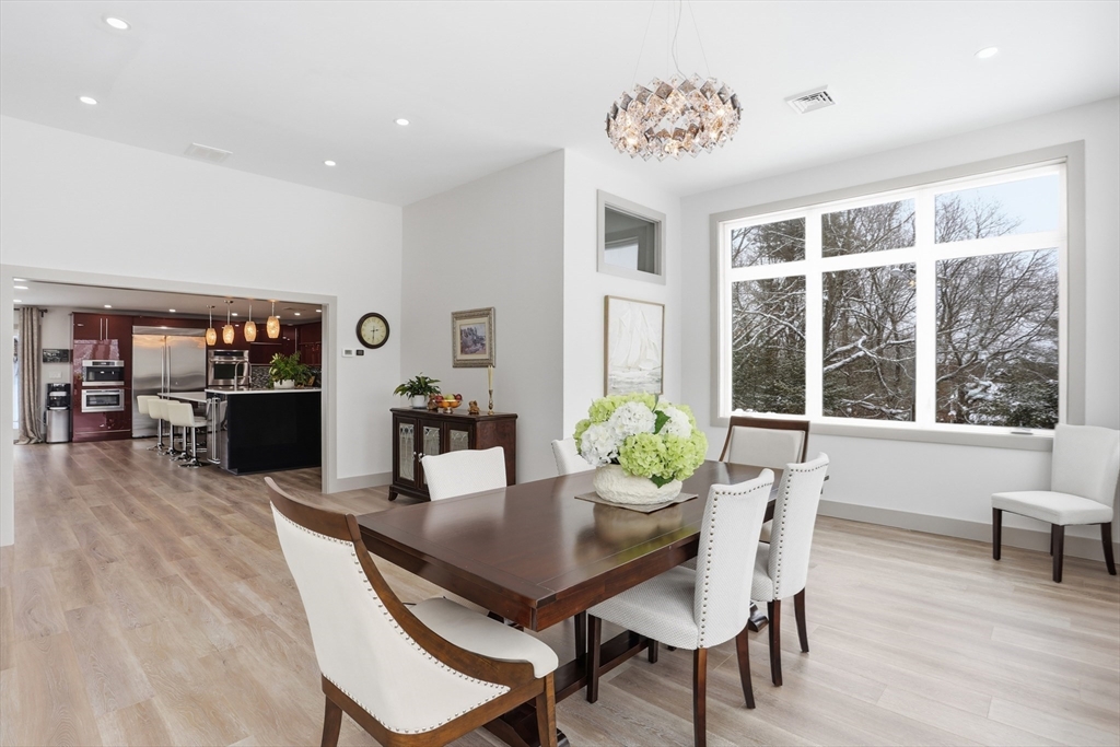 235 Kemp Street Dunstable, MA 01827 - Photo 12 of 42 a view of a dining room with furniture and wooden floor