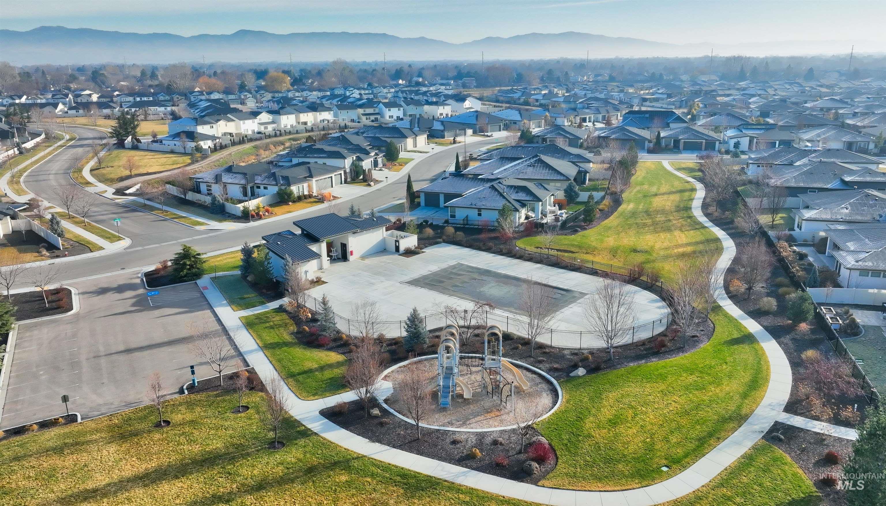 4148 East Copper Point Drive Meridian, ID 83642 - Photo 24 of 26 Aerial view of residential area with a mountain backdrop