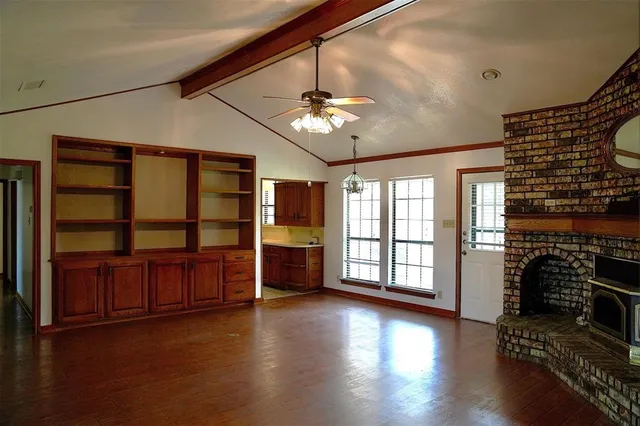 a view of livingroom with furniture wooden floor and window