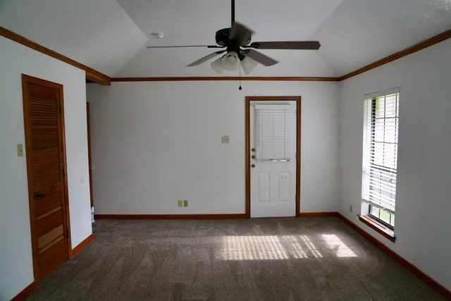a view of an empty room and window