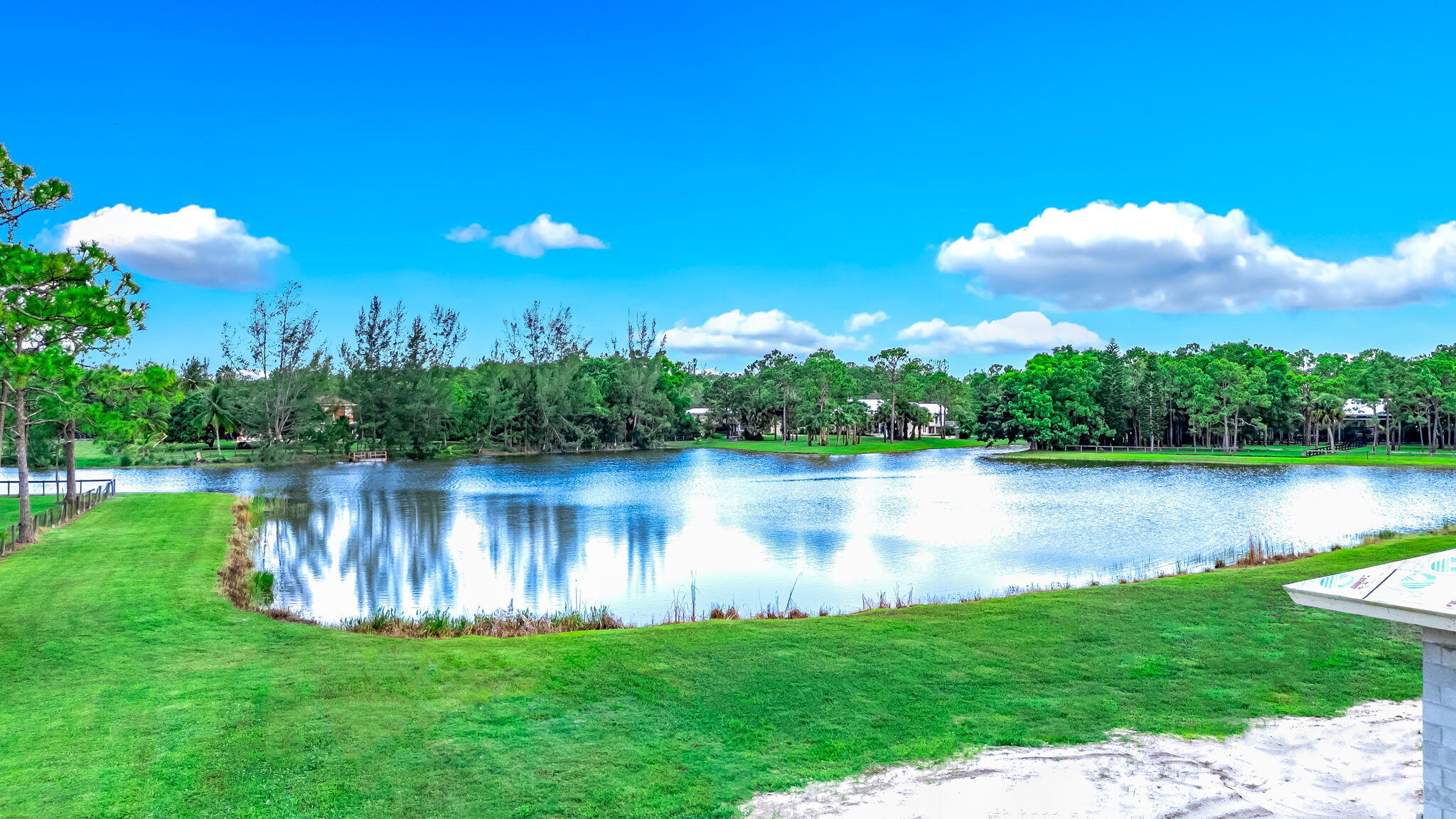 5593 Reynolds Road Lake Worth, FL 33449 - Photo 17 of 27 a view of a lake with a big yard