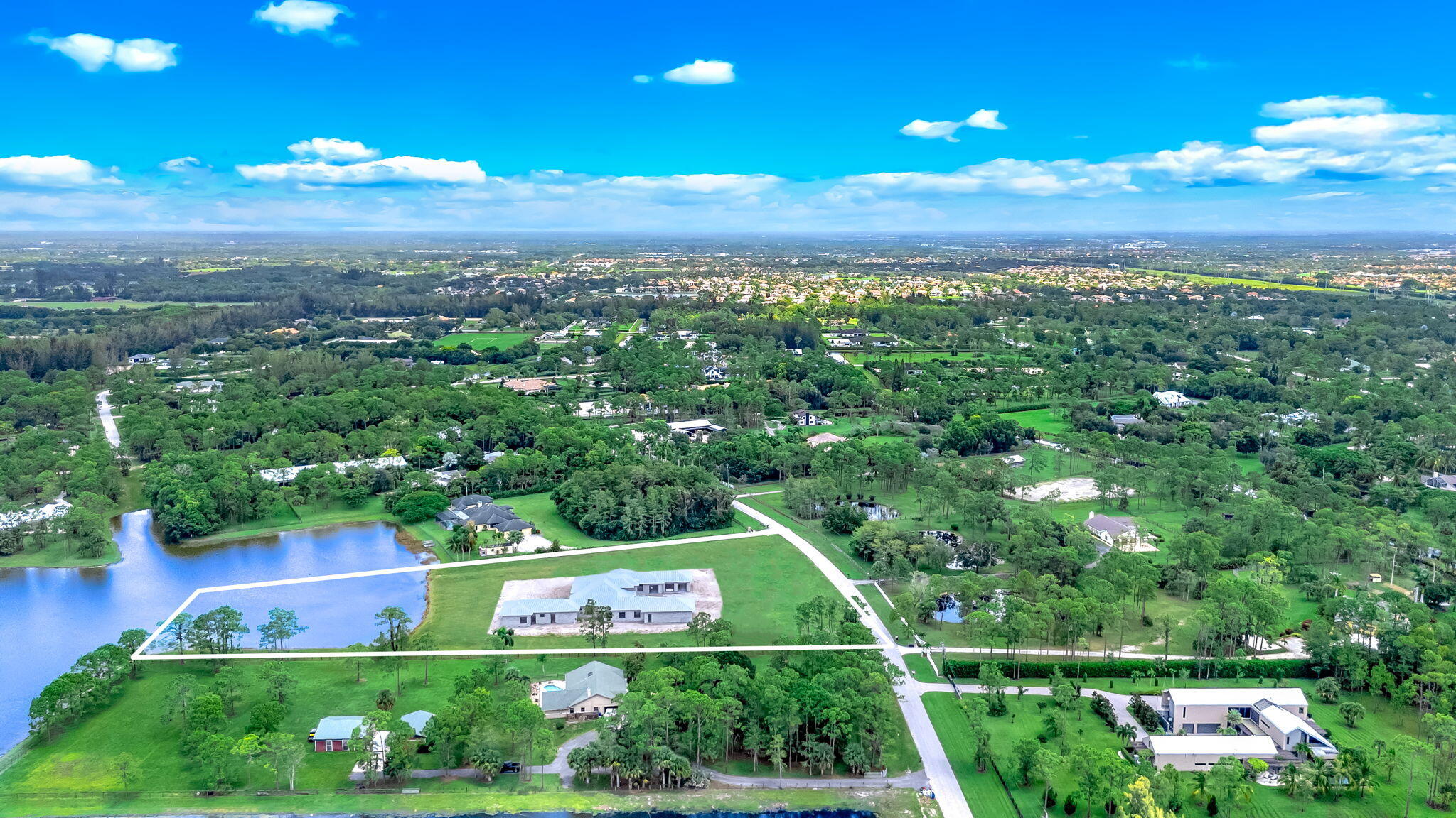 5593 Reynolds Road Lake Worth, FL 33449 - Photo 23 of 27 a view of a garden with an outdoor space