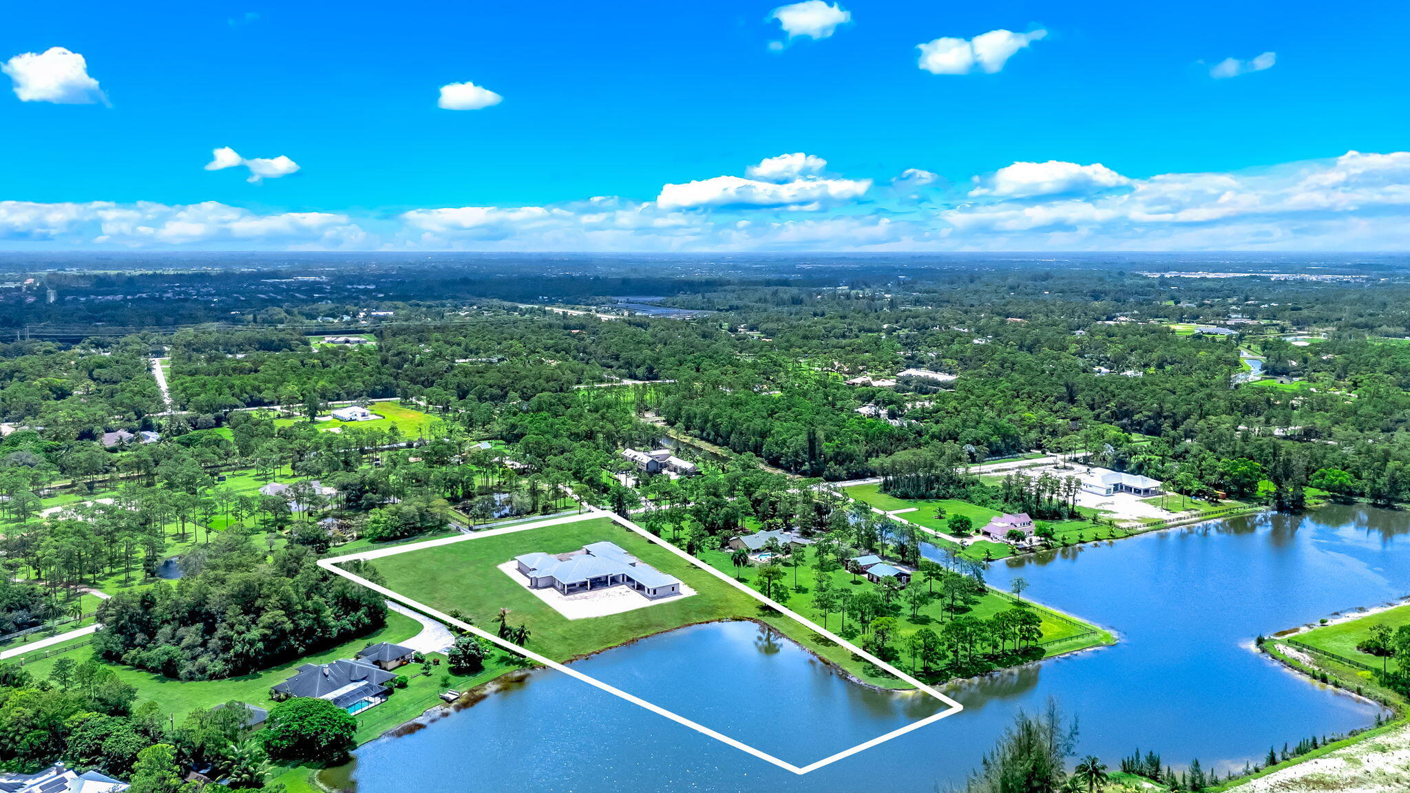 5593 Reynolds Road Lake Worth, FL 33449 - Photo 26 of 27 a view of a city with lots of green space