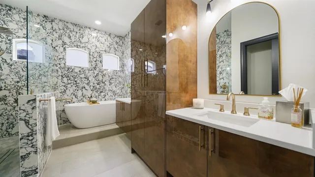 a bathroom with a sink and a mirror