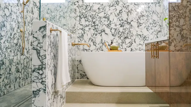 a table with a vase and flowers on it