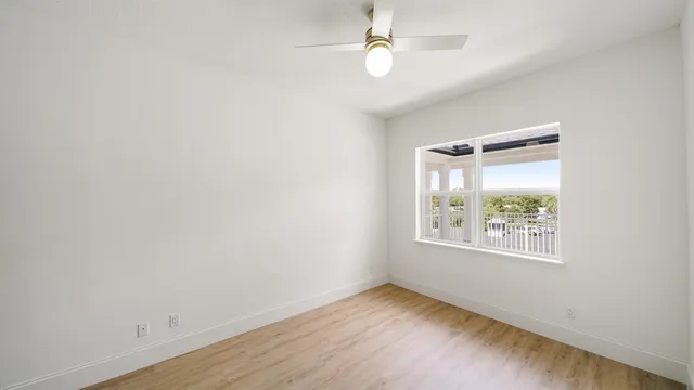 a bathroom with a sink vanity tub and a mirror