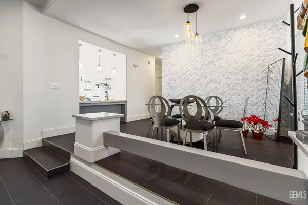 a view of a living room and dining room