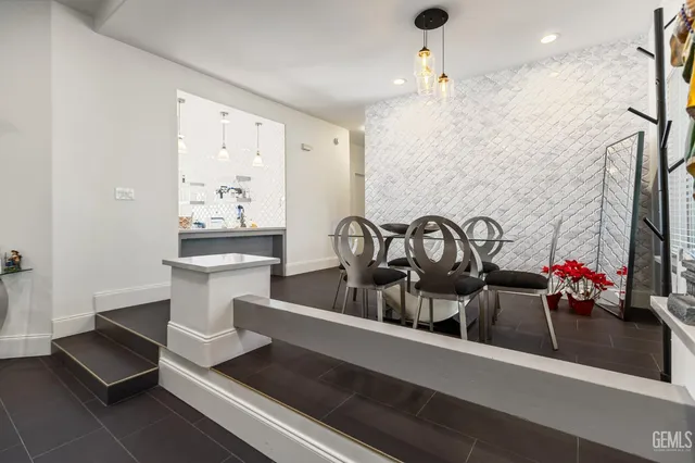 a view of a living room and dining room