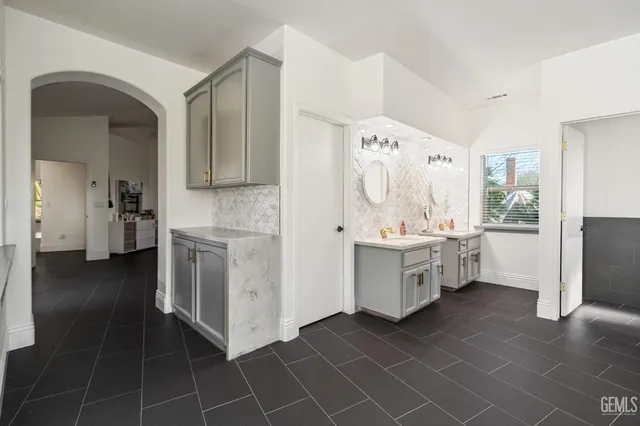 a view of a kitchen with electric appliances