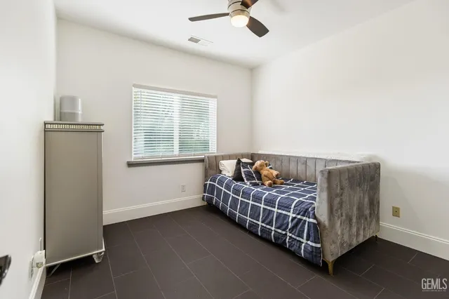 a room with a bed and a window