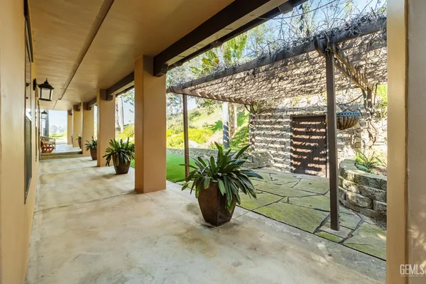 a view of a street with palm trees