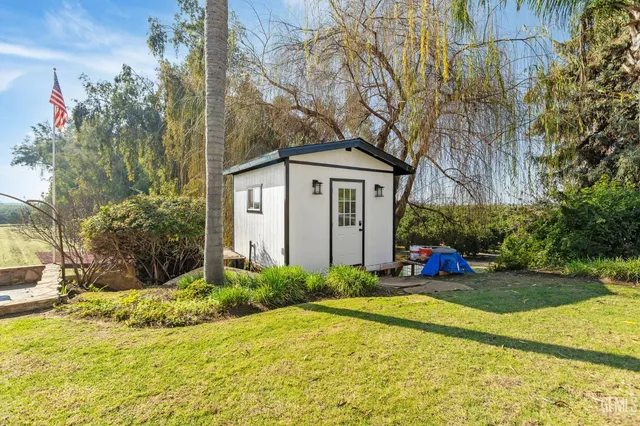 a kitchen with a refrigerator and a sink